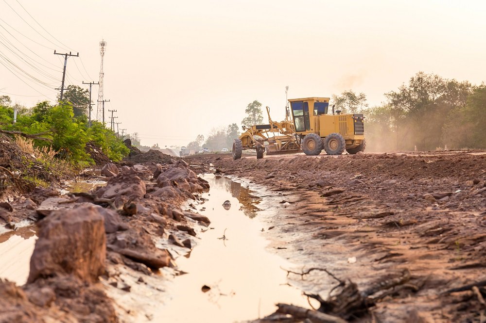 grader working on road building project