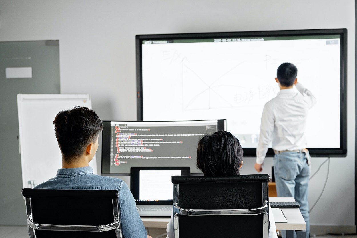 worker on white board