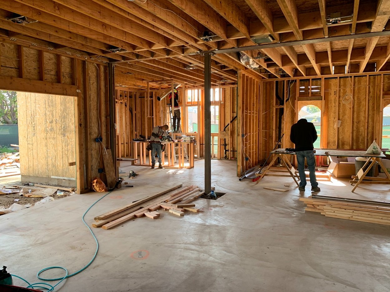 workers framing on construction site